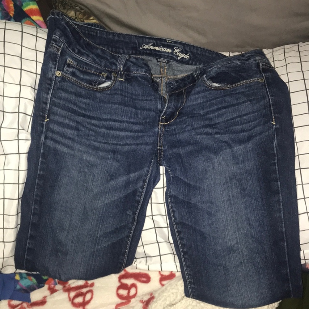 Distressed dark washed worn American Eagle jeans